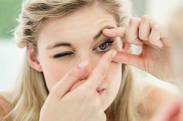 Sanitized and dry fingers are crucial to attaching contact lenses